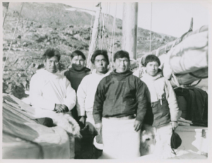 Image of Polar Eskimos [Inughuit] on board Bowdoin [l-r Nukapianguarssuk, Ole Quist, Ussarkak Tautsiak, Navssak Sadorana, Karkutsiak Etah]